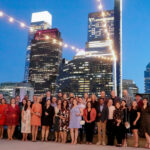 Full group photo from the Devine + Partner's 20th Anniversary party.